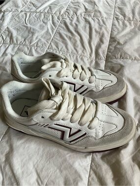 Vans White Sneakers with Light Blue Accent
